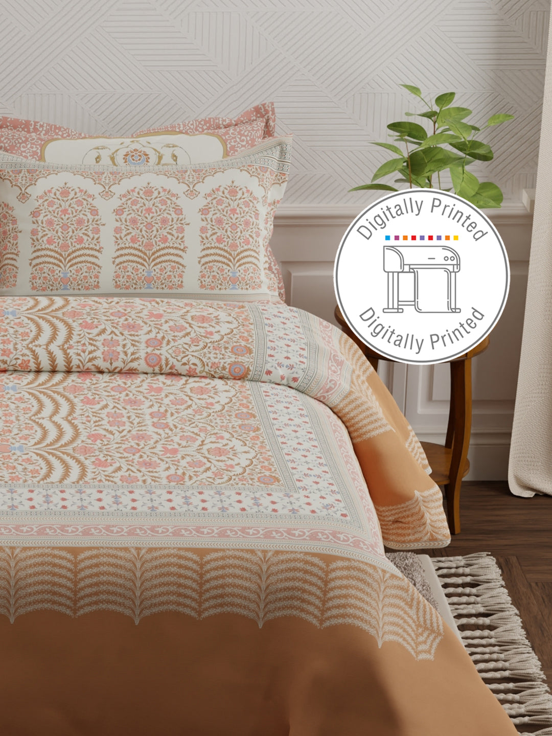 Patterned bedding set on a bed with a plant and furniture in the background, featuring a 'Digitally Printed' label.