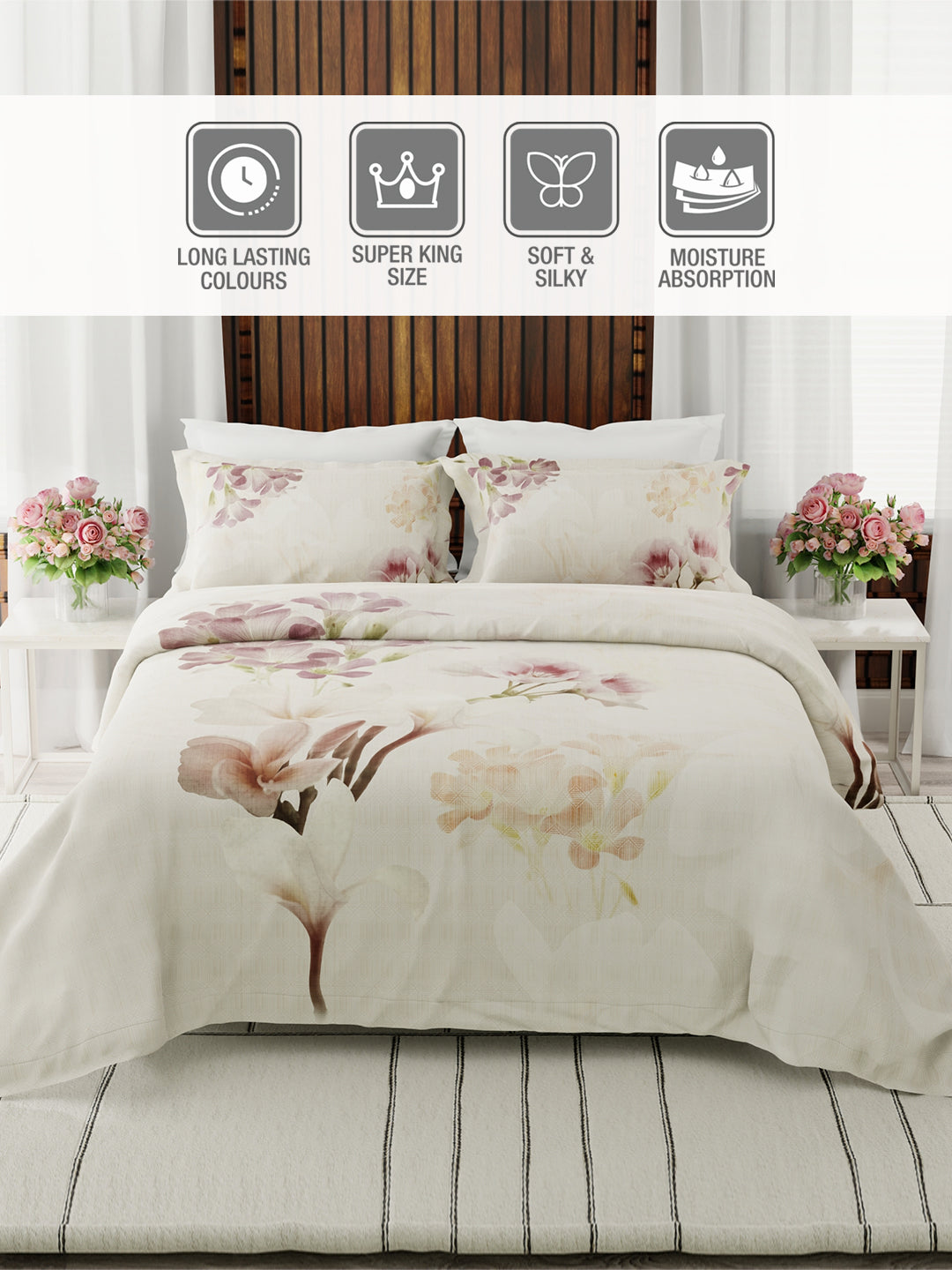 Floral bedding set on a bed with decorative elements and feature icons above.
