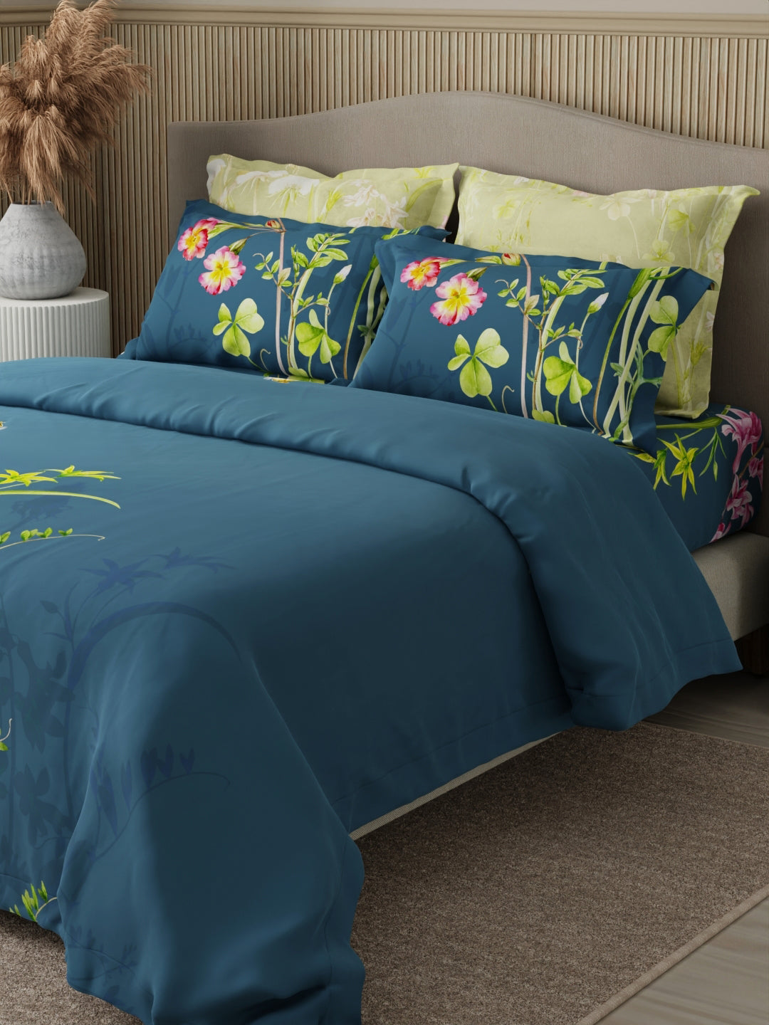 Floral bedding set with decorative pillows on a bed, featuring product features at the top.