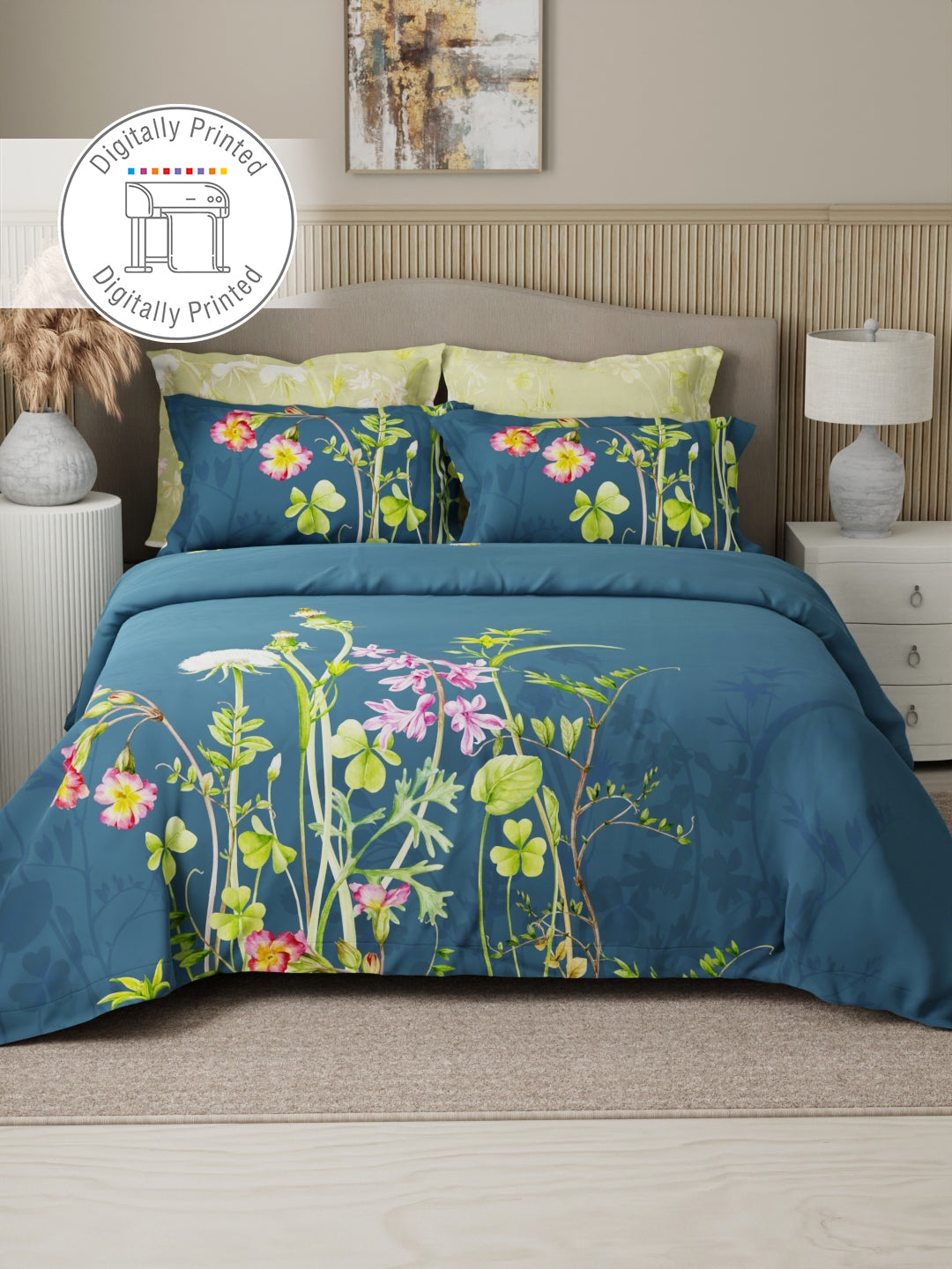 Floral bedding set on a bed with matching pillows in a bedroom setting.