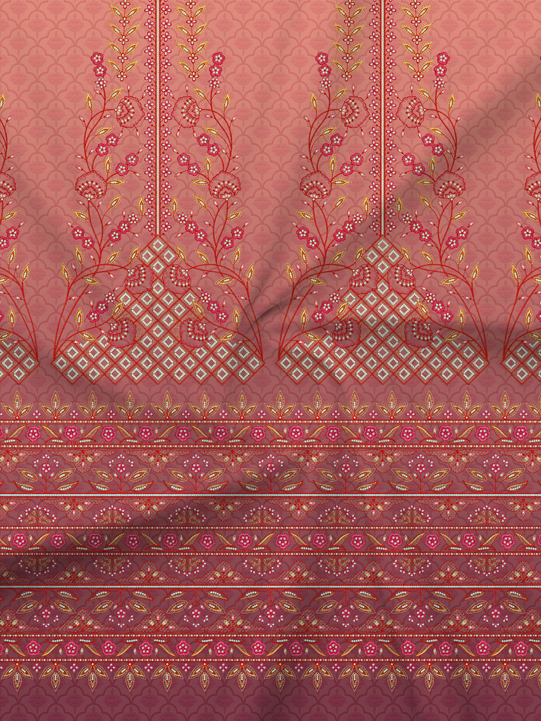 Pink fabric with intricate gold embroidery on a matching pink background