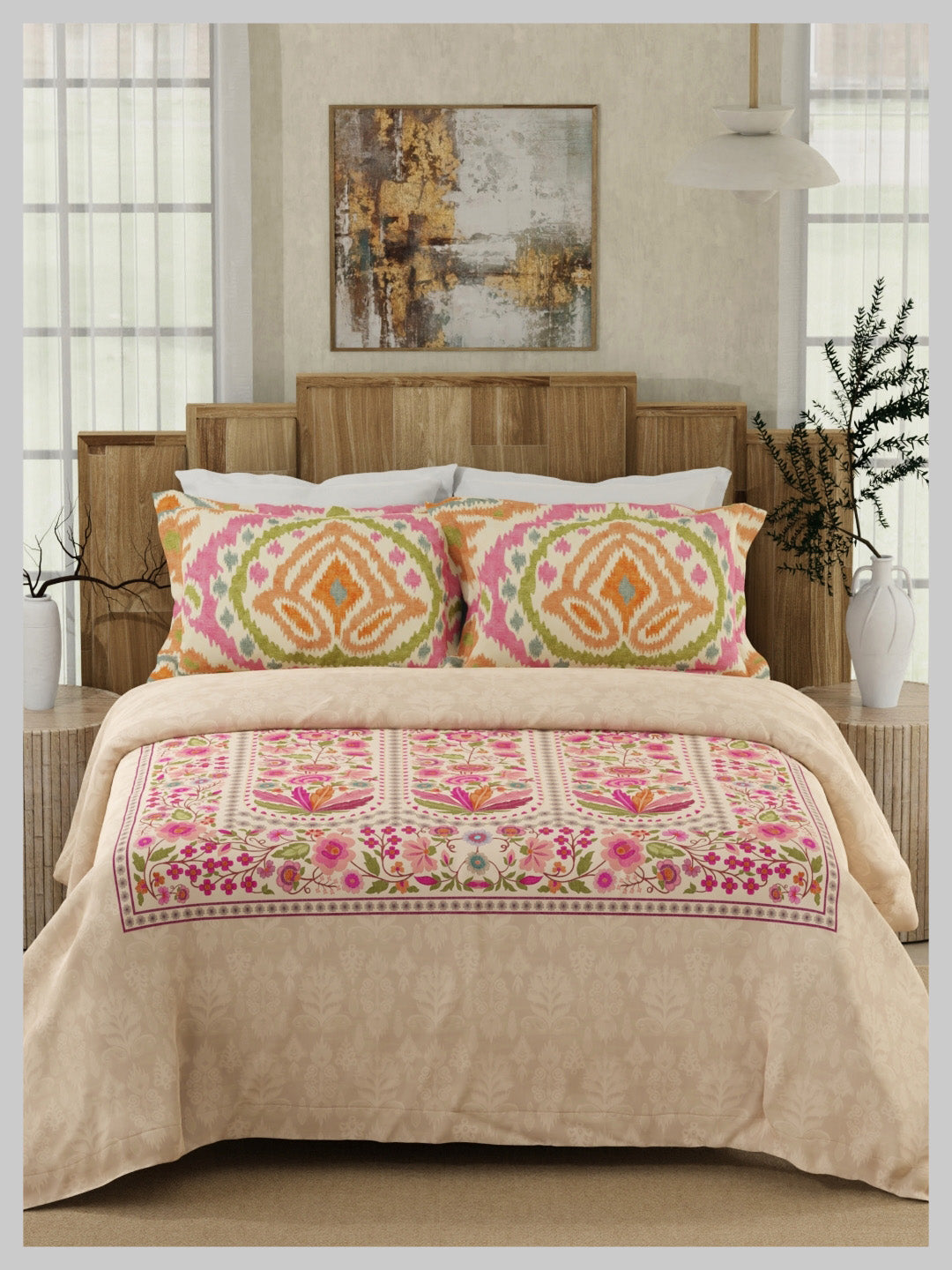 Bedroom with floral comforter and pillows on a wooden bed