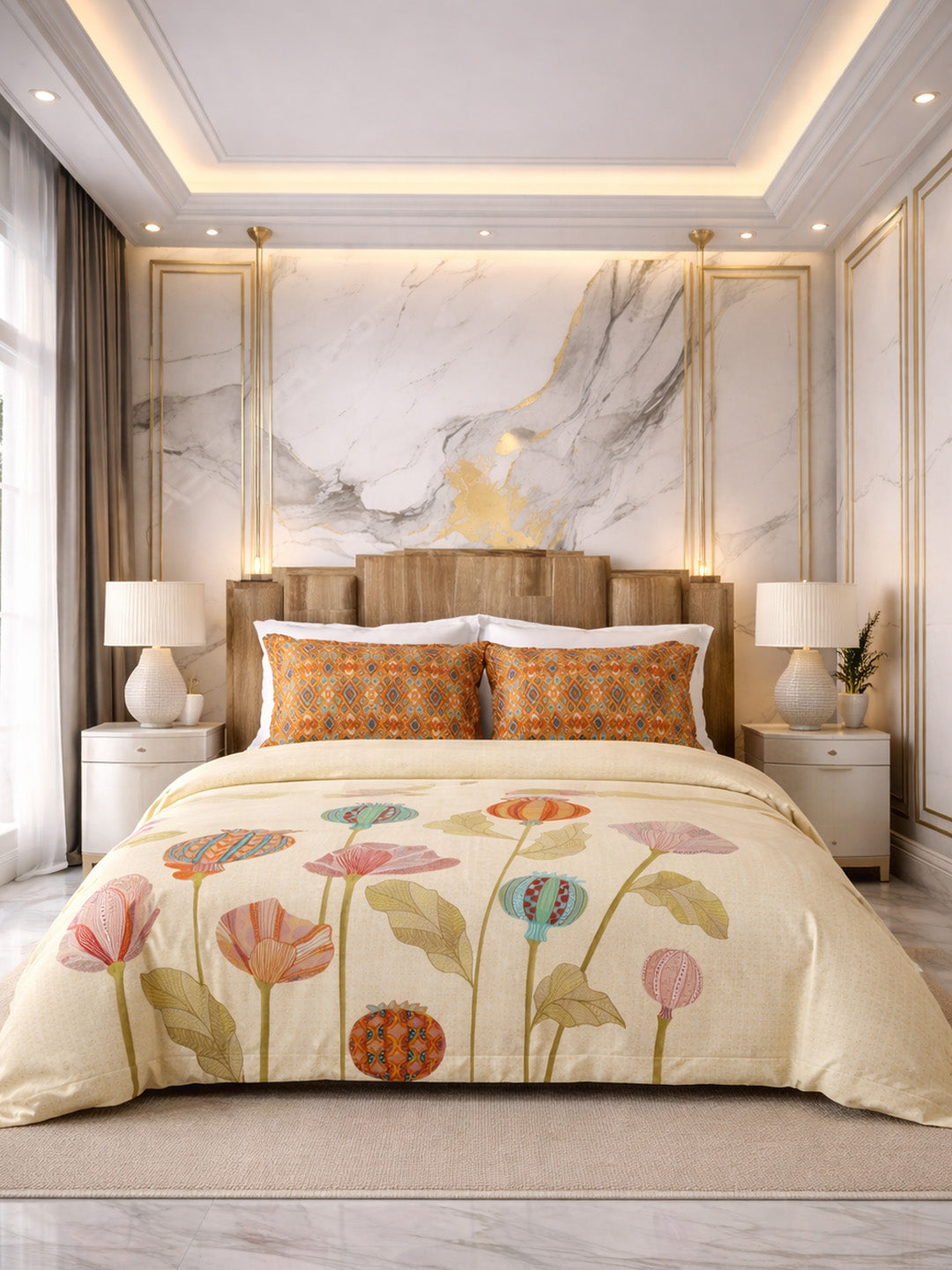 Decorative floral comforter on a bed in a stylish bedroom with marble wall.